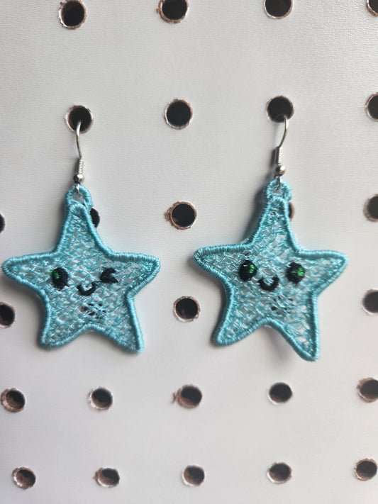 Winking star embroidered earrings
