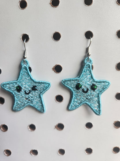 Winking star embroidered earrings