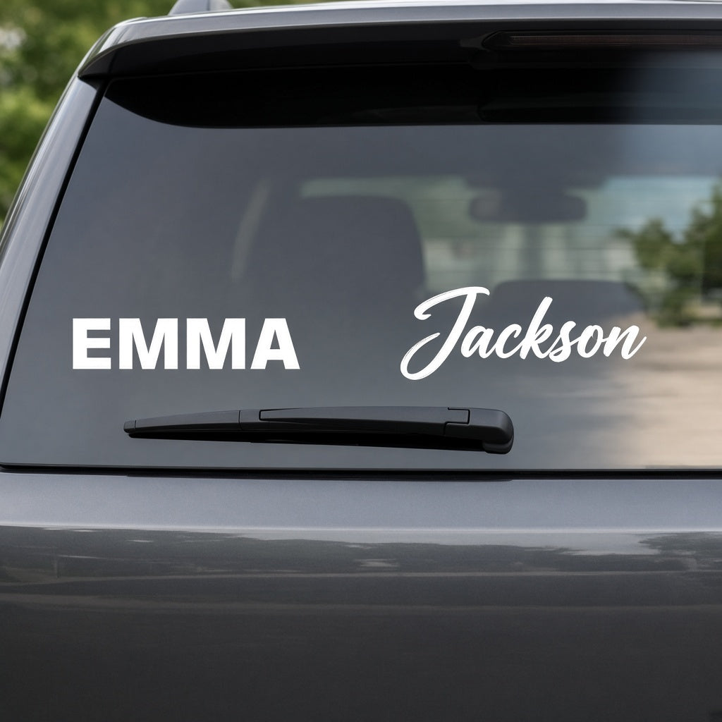 Mockup of custom white vinyl name decals in block and brush script lettering on a car's rear window
