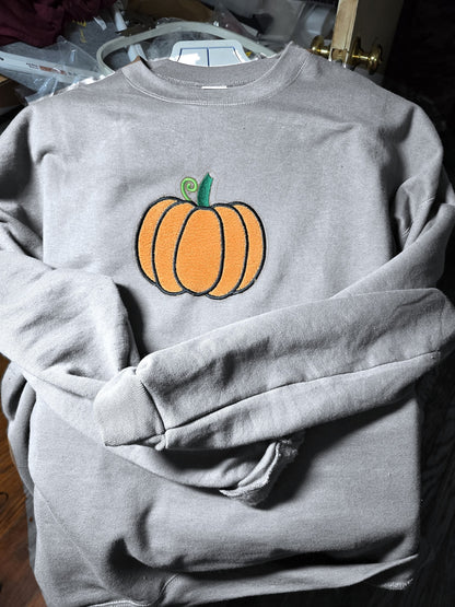 Gray crewneck with fuzzy embroidered pumpkin (mockup)